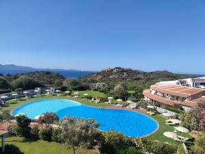 an image of a swimming pool at a resort at Capo Ceraso Family Resort in Costa Corallina