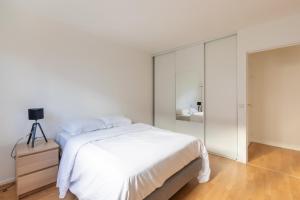 Posteľ alebo postele v izbe v ubytovaní La Nuit en Rose - 3 chambres - Balcon