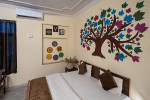 Postel nebo postele na pokoji v ubytování Hotel Lambodar