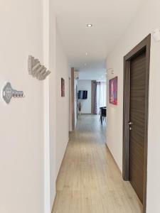 Televízia a/alebo spoločenská miestnosť v ubytovaní Sciascia Apartment