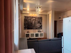 Posezení v ubytování Skaistakalnio apartamentai