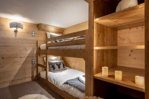 Ένα ή περισσότερα κρεβάτια σε δωμάτιο στο Val Thorens-Cosy Duplex avec vue Silveralp