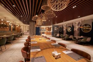 a large dining room with a long table and chairs at Richmond Istanbul in Istanbul +117 photos