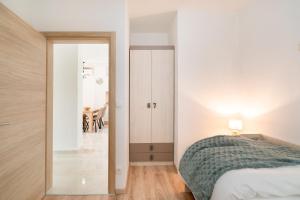 Apartments & Rooms Fisherman's Luck客房内的一张或多张床位