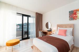Apartments & Rooms Fisherman's Luck客房内的一张或多张床位