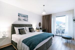 Apartments & Rooms Fisherman's Luck客房内的一张或多张床位