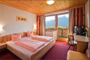 Postelja oz. postelje v sobi nastanitve Hotel Burtschahof
