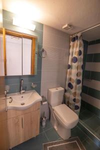 Ванна кімната в Ioannis Rooms Δωμάτια με θεα στη θαλασσα