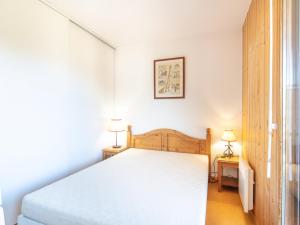 Posteľ alebo postele v izbe v ubytovaní Les Marmottes- 38- Appart Vue montagne- 4 pers