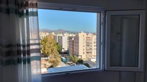 Nespecifikovaný výhled na destinaci Málaga nebo výhled na město při pohledu z apartmánu