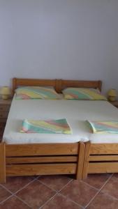 Posteľ alebo postele v izbe v ubytovaní Apartment in Vir with sea view, terrace, air conditioning, WiFi 4472-2