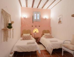 Postel nebo postele na pokoji v ubytování Casa rural con jacuzzi y chimenea en paraje único - La Casa del Pino