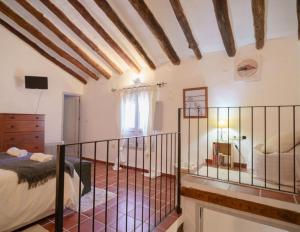 Postel nebo postele na pokoji v ubytování Casa rural con jacuzzi y chimenea en paraje único - La Casa del Pino