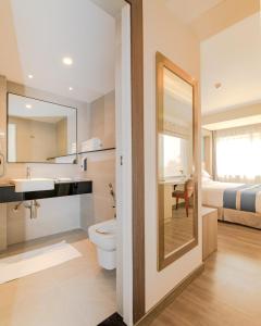Koupelna v ubytování Mila Hotel