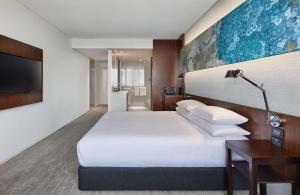 Postel nebo postele na pokoji v ubytování Hyatt Regency Brisbane