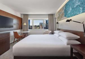 Postel nebo postele na pokoji v ubytování Hyatt Regency Brisbane