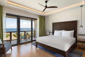 Postel nebo postele na pokoji v ubytování InterContinental Dominica Cabrits Resort & Spa by IHG