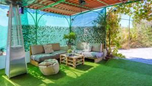 Vonkajšia záhrada v ubytovaní Casa Rural La Milla Verde Málaga - Campanillas by Ruralidays