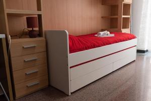 A bed or beds in a room at Genova-tra mare e centro storico