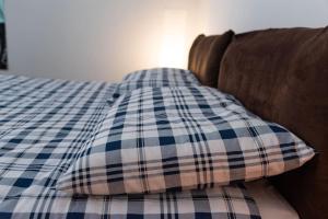 A bed or beds in a room at Genova-tra mare e centro storico