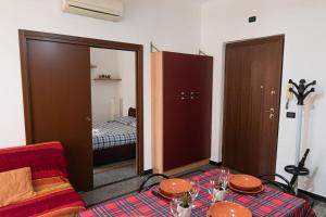 A bed or beds in a room at Genova-tra mare e centro storico
