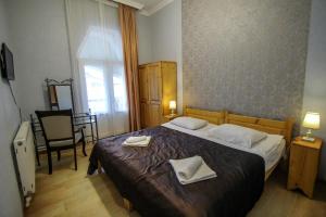 Letto o letti in una camera di Hotel Svaneti