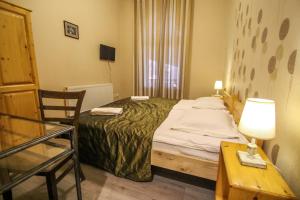 Letto o letti in una camera di Hotel Svaneti