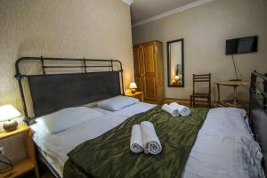 Letto o letti in una camera di Hotel Svaneti
