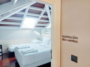 Posteľ alebo postele v izbe v ubytovaní Hotel O Semaforo