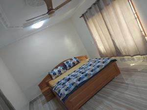 Ein Bett oder Betten in einem Zimmer der Unterkunft Masbella Airbnb