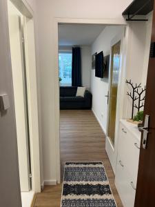 Telewizja i/lub zestaw kina domowego w obiekcie Modernes 4er Apartment in Skilift-Nähe