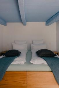 Cama ou camas em um quarto em Corippo Albergo Diffuso