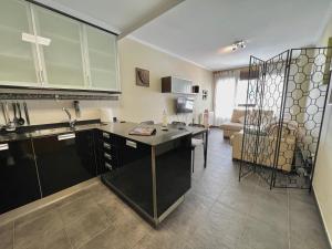 Kuchnia lub aneks kuchenny w obiekcie GIRALDA 2