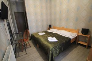 Letto o letti in una camera di Hotel Svaneti