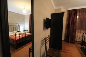 Letto o letti in una camera di Hotel Svaneti