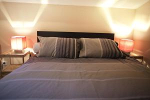 Cama o camas de una habitación en Chez Maud et Jc