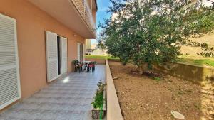 Zahrada ubytování Apartments Mandalinic