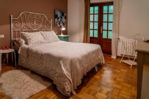 Łóżko lub łóżka w pokoju w obiekcie Piso con excelentes vistas