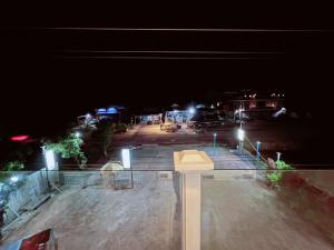 a view of a parking lot at night at Thyda koh kong in Koh Kong