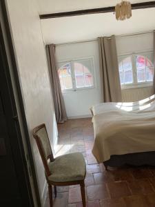 Posteľ alebo postele v izbe v ubytovaní Toulouse centre: T2 bis dans immeuble historique