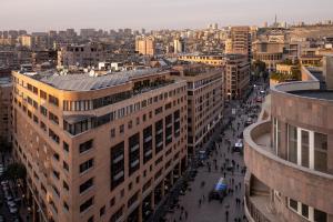 an aerial view of a city with buildings at Hilltop North Avenue by Stellar Hotels, Yerevan in Yerevan +112 photos
