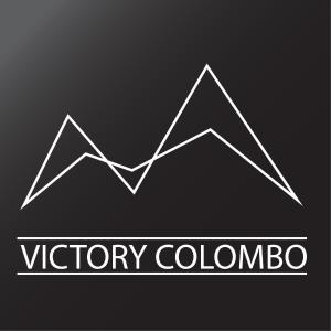 um logótipo de uma montanha com as palavras colosso vitória em Victory colombo em Colombo
