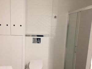 Łazienka w obiekcie Apartament IGA