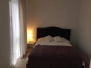 Łóżko lub łóżka w pokoju w obiekcie Apartament IGA