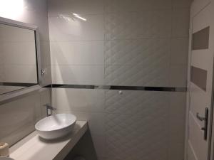 Łazienka w obiekcie Apartament IGA
