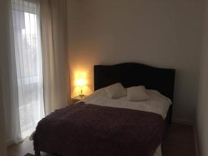 Łóżko lub łóżka w pokoju w obiekcie Apartament IGA