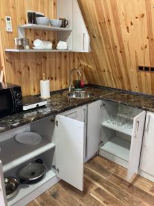 a kitchen with a sink and a counter top at Green Villa Resort Grey in Dilijan