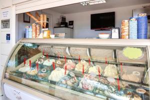 a display case of chickens in a store at Easyatent Safari tent Park Umag in Umag