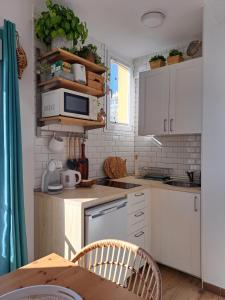 A kitchen or kitchenette at Estudio Pies de Arena