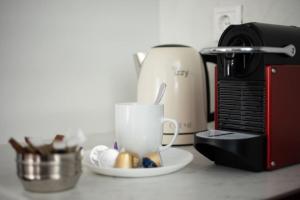 Coffee and tea making facilities at Blue Delta Apartment Palaio Faliro
